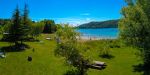 Plage naturelle surveillée du camping Détente et Clapotis sur le Lac de Paladru, Montferrat Isère